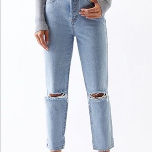 Light wash knee slit straight leg jeans.